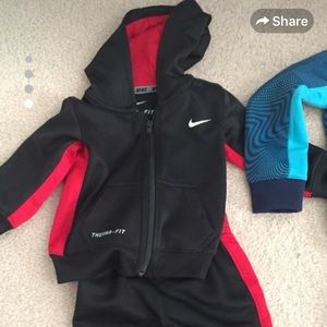 Nike 12 mos. track suit.